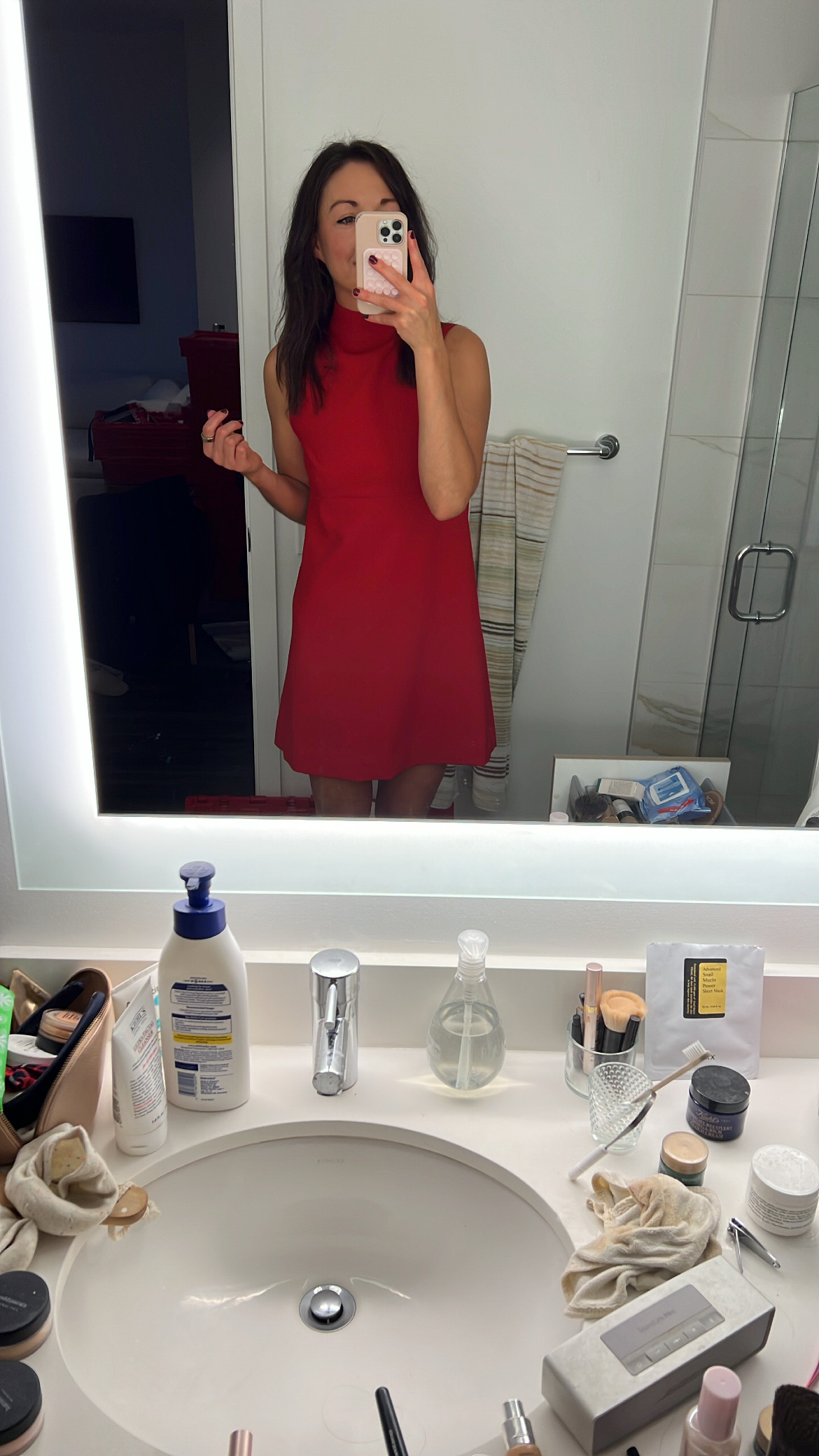 red holiday dress with a big bow tie in the back